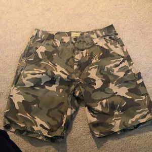 Men’s carpenter shorts.  Camo print.